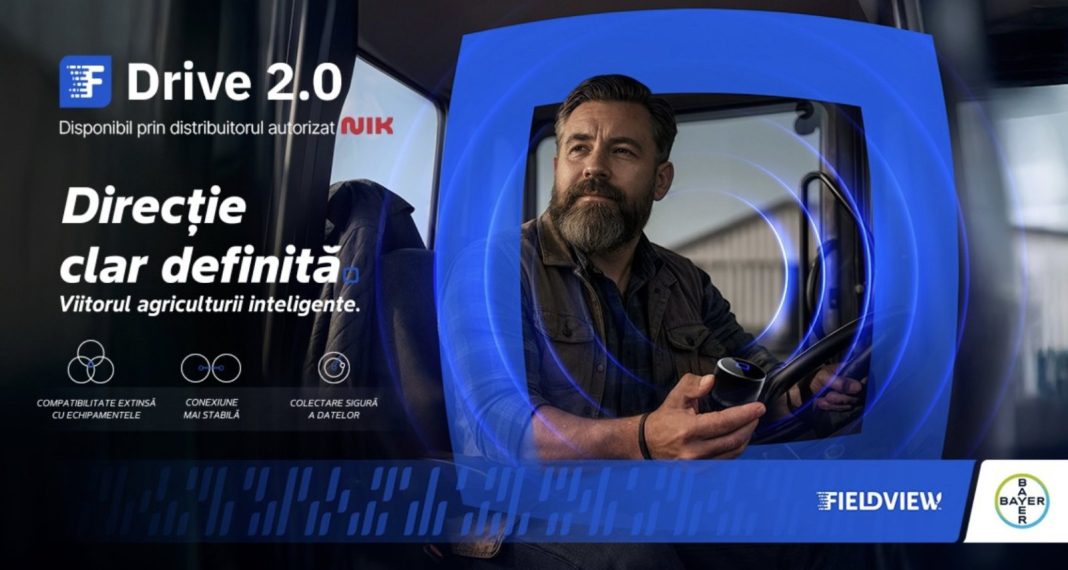 Drive 2.0 promotional banner showing a man in a truck cab with blue circular light effects and the text 'Direcție clar definită' in Romanian, with FieldVIEW and Bayer logos.